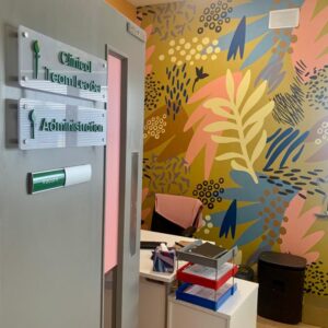 A door open to a room with Clinical Team Leader, Administration and vacant signs on the door