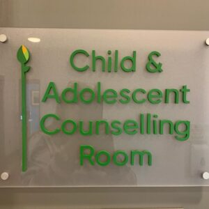 A sign reading: Child & Adolescent Counselling Room
