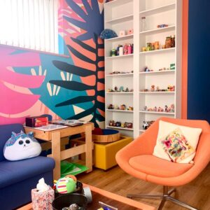 A colourful room with an orange theme to it