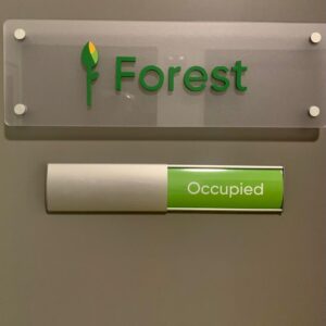 A sign that reads Forest and a slider that shows occupied