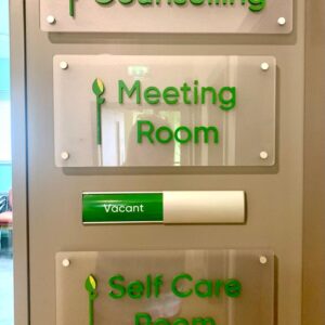 Signs that read: Counselling, Meeting Room and Self Care room. And a slider that reads vacant