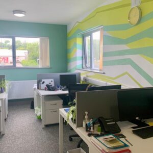 An office work space with desks and computers at each